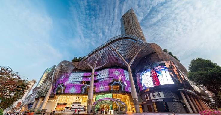 ION Orchard’s glass canopy and illuminated facade by day